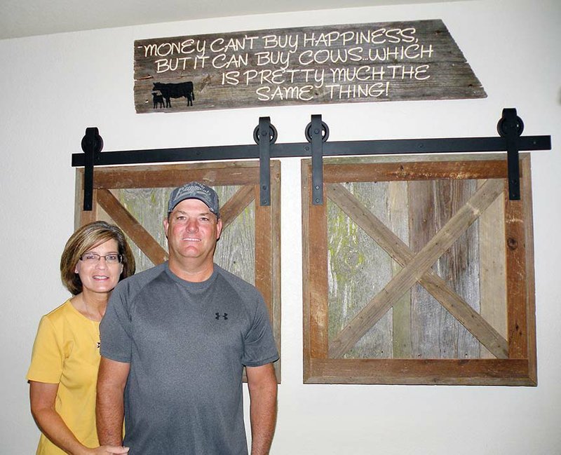 Judy and Michael Dixon of Ola are the 2017 Yell County Farm Family of the Year. They raise cattle and poultry on their 400-acre farm. The 
Dixons built a shop, complete with heat and air, about two years ago that includes a small apartment where they display this artistic installation that Judy designed.