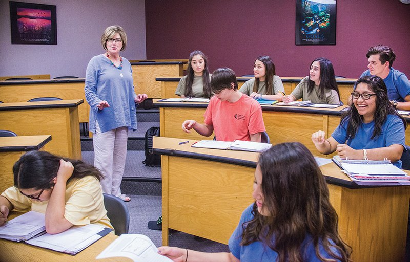 Katrina Smeltzer, director of Harding University’s Upward Bound program, speaks to students as they participate in the residential summer program. Smeltzer said the entire staff is committed to making a difference in the lives of the program’s participants.