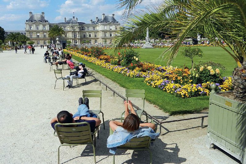 Put your weary feet up in Luxembourg Garden, a picturesque place to recharge in Paris. 