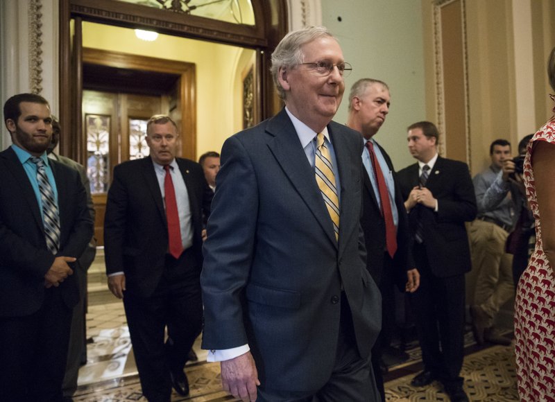 Senate Majority Leader Mitch McConnell of Ky. leaves the Senate chamber on Capitol Hill in Washington, Thursday, July 13, 2017, after announcing the revised version of the Republican health care bill. The bill has been in jeopardy because of opposition from within the GOP ranks. (AP Photo/J. Scott Applewhite)