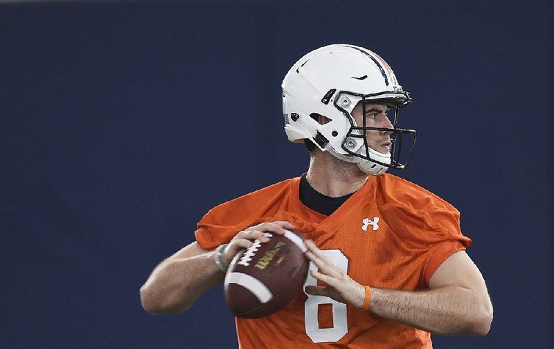 Auburn quarterback Jarrett Stidham works out Feb. 28 during the ÿrst day of spring football practice at the Auburn Athletics Complex in Auburn, Ala. The Tigers are a key SEC team to watch this season, especially during games against Clemson, LSU, Georgia and Alabama.
