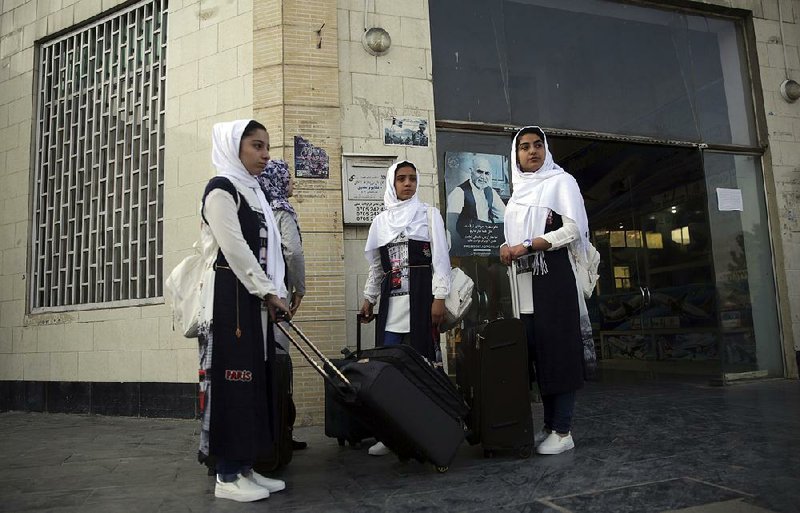 Members of an all-girls robotics team from Herat, Afghanistan, prepare to leave Kabul for their flight Friday to the U.S. It took some doing, but they finally arrived early Saturday in Washington. 