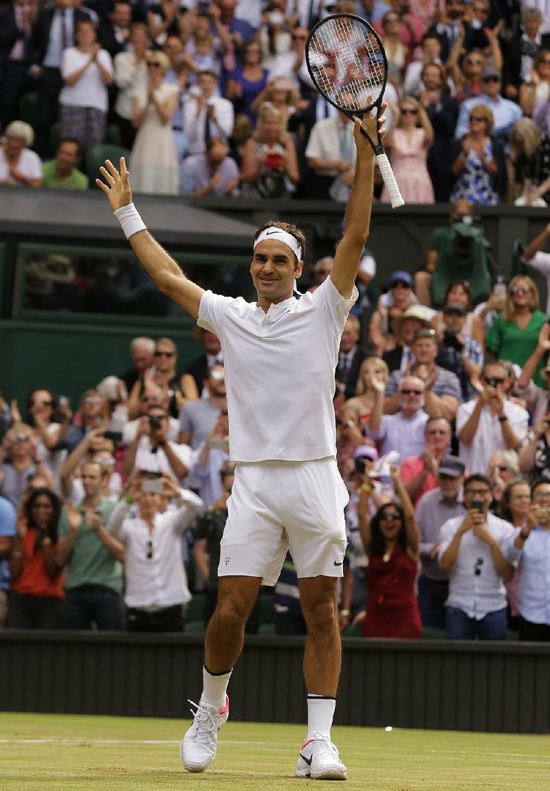 Roger Federer (above) celebrates after defeating Marin Cilic to win the men’s singles championship at Wimbledon on Sunday in London. Federer, 35, is the oldest male champion at the All England Club in the Open era, which began in 1968. Wimbledon is the second Grand Slam title Federer has won this year. He defeated Rafael Nadal in the Australian Open final in January.