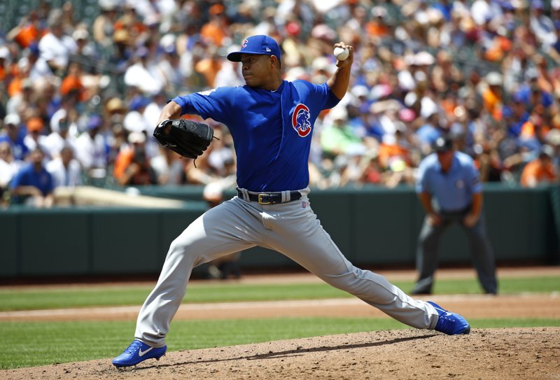 Chicago Cubs starting pitcher Jose Quintana throws to the Baltimore Orioles in the second inning of a baseball game in Baltimore, Sunday, July 16, 2017. 