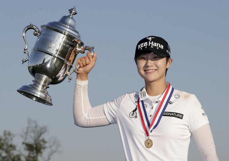 South Korea's Sung Hyun Park holds up the championship trophy after winning the U.S. Women's Open Golf tournament Sunday, July 16, 2017, in Bedminster, N.J. 