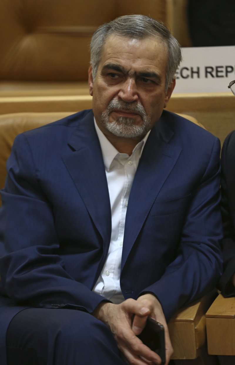In this picture taken on Monday, July 3, 2017, Hossein Fereidoun, brother and top aide of moderate Iranian President Hassan Rouhani sits in a conference in Tehran, Iran. The semi-official Tasnim news agency reported on Sunday, July 16, that Hossein Fereidoun has been detained over financial matters. 