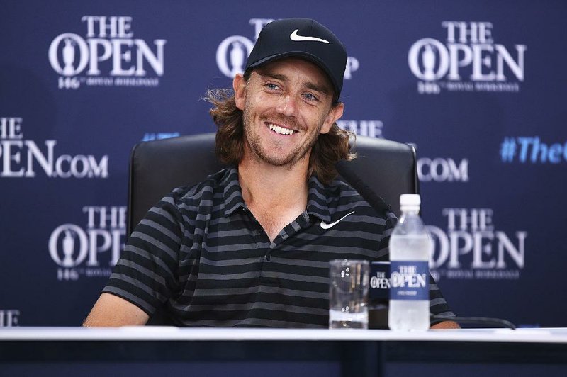 English golfer Tommy Fleetwood smiles during a press conference in the second practice day at the British Open Golf Championship at Royal Birkdale in Southport, England, Monday, July 17, 2017. 