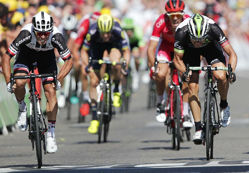 Michael Matthews (left) won a sprint to the line in Stage 16 of the Tour de France as Britain’s Chris Froome kept the yellow jersey Tuesday ahead of two difficult days in the Alps. 
