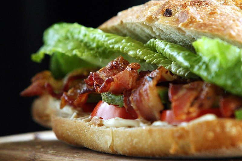 Caramelized bacon and slices of avocado dress up almost-classic BLT. 