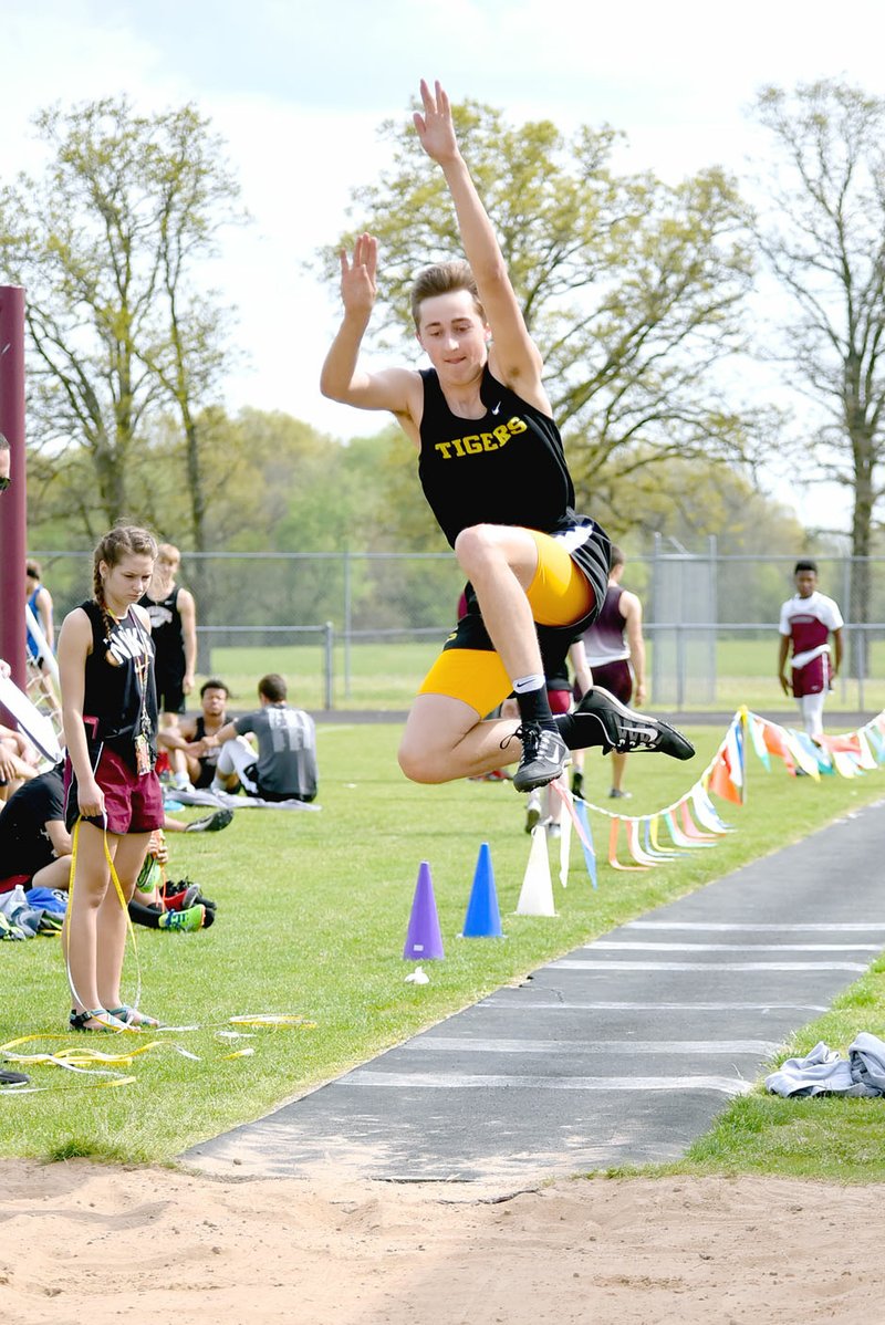 Shelley Williams Special to the Enterprise-Leader Prairie Grove benefited by acquiring equipment for jumping events. Prairie Grove sophomore Nick Pohlman, shown competing in mid-April, developed confidence and soared to a winning leap of 20-03.00 at the 4A-1 Conference long jump championship hosted by Pea Ridge April 25.