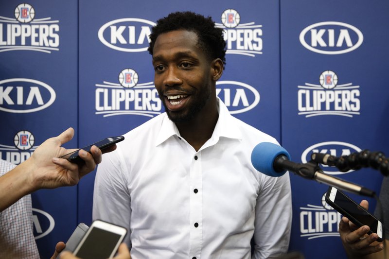 Los Angeles Clippers' Patrick Beverley talks to reporters after an NBA basketball news conference Tuesday, July 18, 2017, in Los Angeles. (AP Photo/Jae C. Hong)