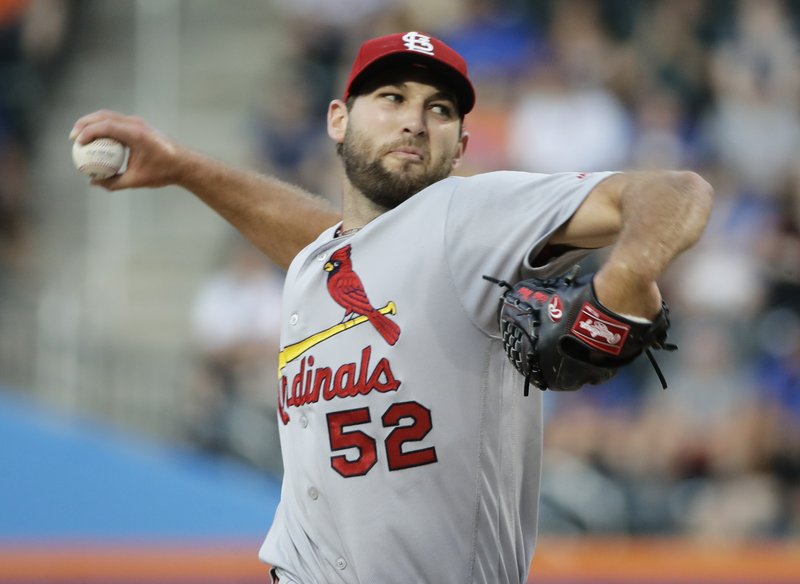 St. Louis Cardinals' Michael Wacha winds up during the first inning of the team's baseball game against the New York Mets on Tuesday, July 18, 2017, in New York. (AP Photo/Frank Franklin II)