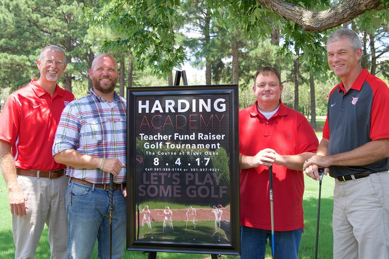 From left, Darren Mathews, Joel Hoggard, Jeremy Myers and Bode Teague prepare for the Harding Academy Teacher Fundraiser Golf Tournament that will take place Aug. 4 at The Course at River Oaks in Searcy. Myers said the fundraiser will relieve some of the financial burden that teachers have at the academy.