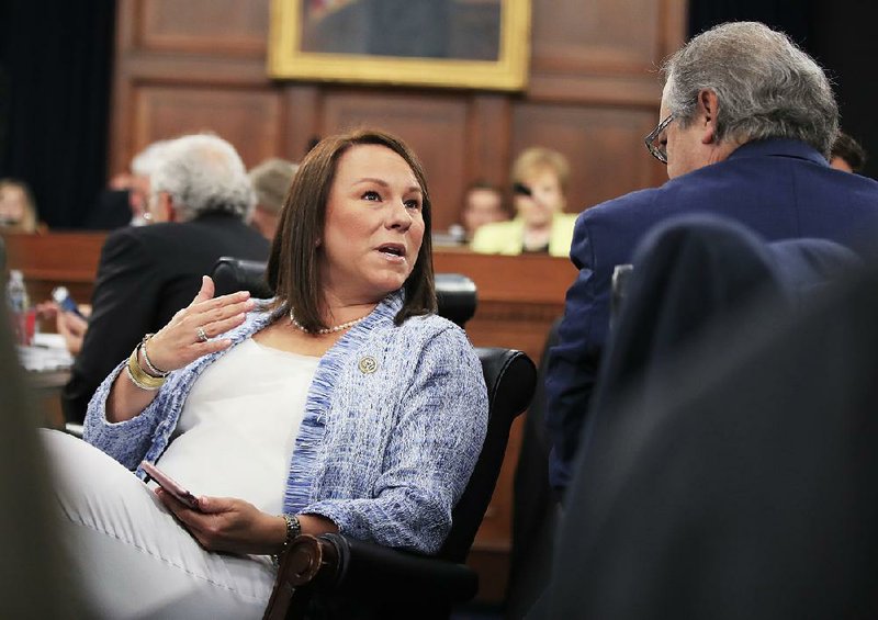 Rep. Martha Roby, R-Ala., confers with a fellow lawmaker during a hearing on the fiscal-2018 budget Wednesday on Capitol Hill. 