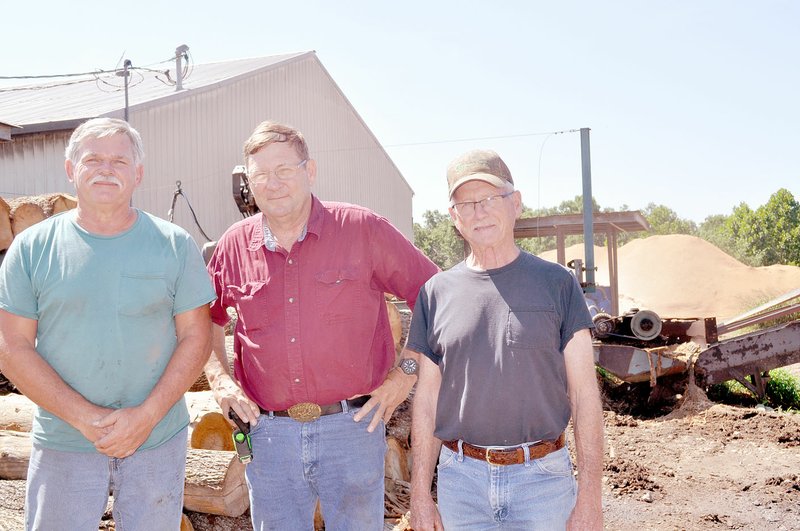 RACHEL DICKERSON/MCDONALD COUNTY PRESS Jerry Patterson, left, Scott Leonard, and Mark Alumbaugh are co-owners of Patterson Lumber near Anderson.