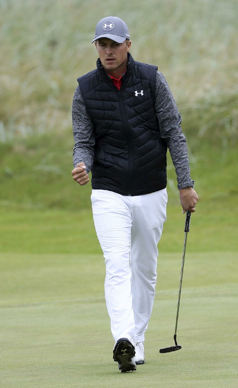 Jordan Spieth missed fi ve fairways over the fi rst seven holes, but he rebounded to finish with a 5-under 65 to grab a share of the lead with Brooks Koepka and Matt Kuchar after the opening round of the British Open on Thursday at Royal Birkdale Golf Course in Southport, England.