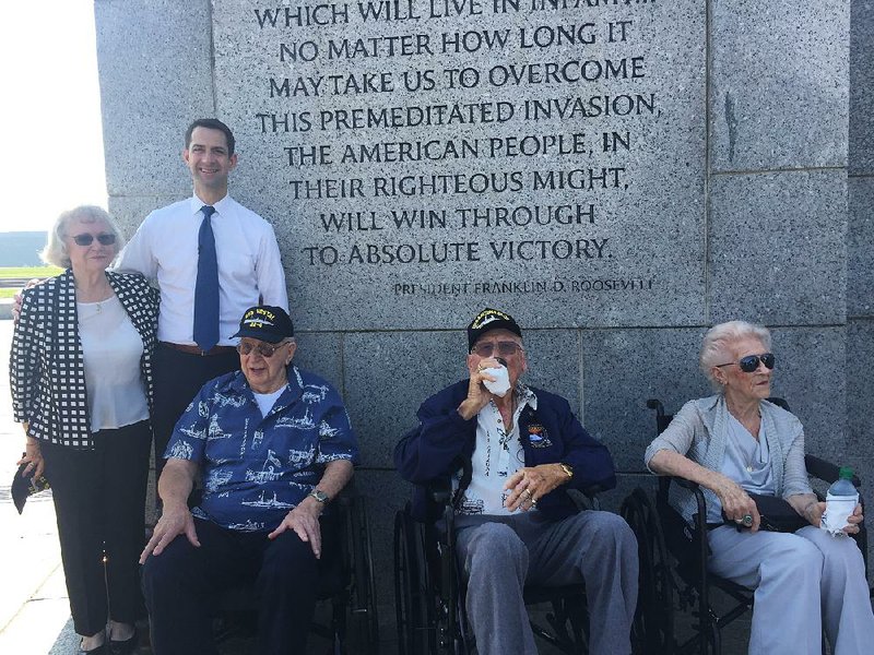 Joe Ann Taylor, U.S. Sen. Tom Cotton, R-Ark., and Pearl Harbor survivors Donald Stratton and Lauren Bruner visit the World War II Memorial in Washington, D.C., on Thursday. Taylor’s father rescued Stratton, Bruner and four others in the 1941 Japanese attack and will be honored by President Donald Trump today.