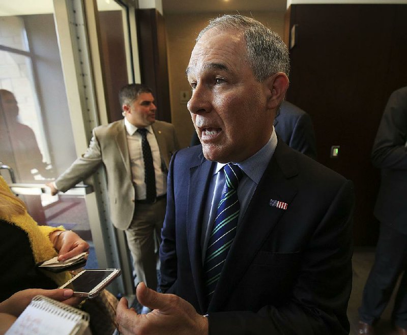 Scott Pruitt, head of the U.S. Environmental Protection Agency, talks after visiting with Arkansas officials and agriculture representatives Thursday in Little Rock. 