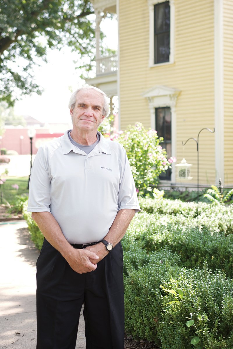 Photographer Lynn Reinbolt stands outside of The Black House in Searcy. Reinbolt recently donated 67 photos to Unity Health in Searcy to use as wall art. Reinbolt said Unity Health is one of the community’s flagship institutions.