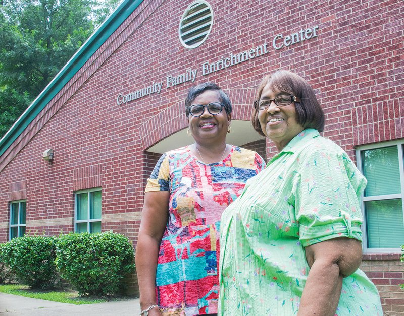 Patricia Wright, left, the executive director for the Community Family Enrichment Center in Arkadelphia, and Estella Forte, board member, stand in front of the building. The Center will be celebrating 20 years on Thursday beginning at 4 p.m. 
