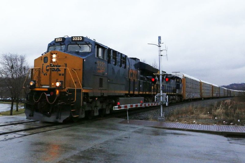 A CSX freight train passes through Homestead, Pa., earlier this year. 