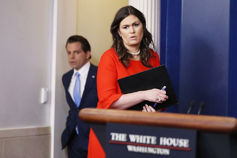 Anthony Scaramucci, incoming White House communications director, follows new White House press secretary Sarah Huckabee Sanders into the briefing room Friday at the White House.