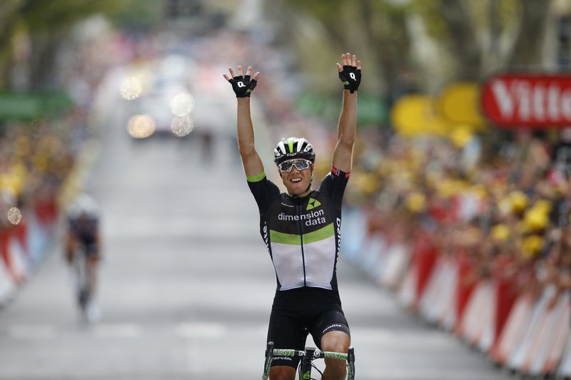 The Associated Press WINNING THE STAGE: Norway's Edvald Boasson Hagen celebrates as he crosses the finish line to win the 19th stage of the Tour de France cycling race over 222.5 kilometers (138.3 miles) with start in Embrun and finish in Salon-de-Provence, France, Friday.