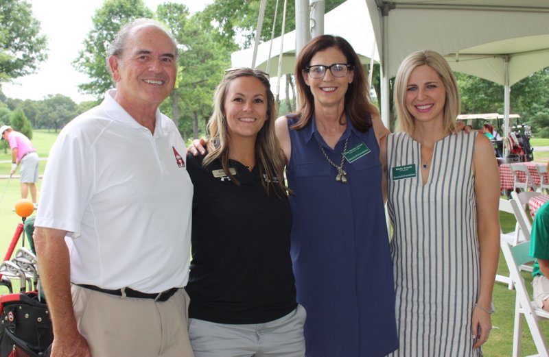 Gary Adams (from left), Jessica Hudson, Betsy Broyles Arnold and Molly Arnold gather at the second annual Drive and Dine for Dementia golf tournament July 14 at Paradise Valley Golf and Athletic Club in Fayetteville.