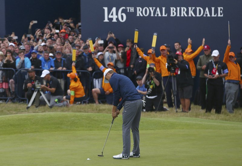 The Associated Press WINNING PUTT: Jordan Spieth of the United States putts to win the British Open Golf Championship at Royal Birkdale, Southport, England, Sunday. Spieth joins Jack Nicklaus as the only player to win three majors at age 23.
