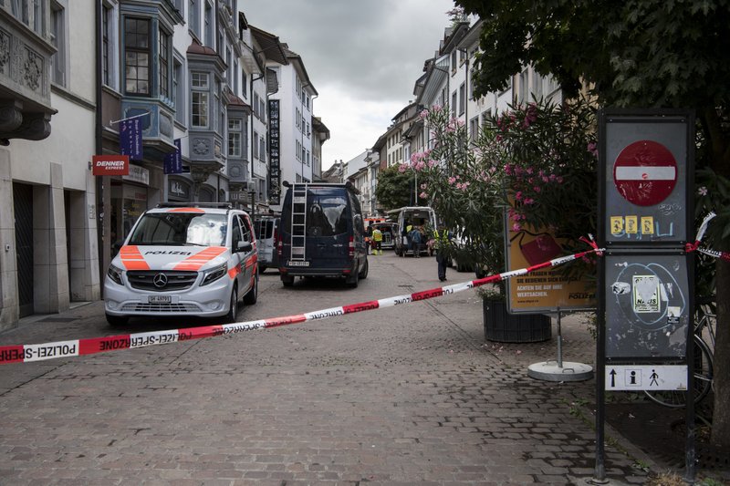 The police shut down the old town of Schaffhausen in Switzerland, while they search for an unknown man who attacked people, on Monday, July 24, 2017. Swiss police say five people have been hospitalized, two of them with serious injuries, following the apparent attack in the northern city of Schaffhausen. (Ennio Leanza/Keystone via AP)
