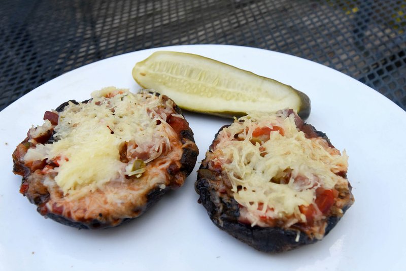 Portobello mushroom pizzas may be a welcome variation after a summer of the usual grill fare.
