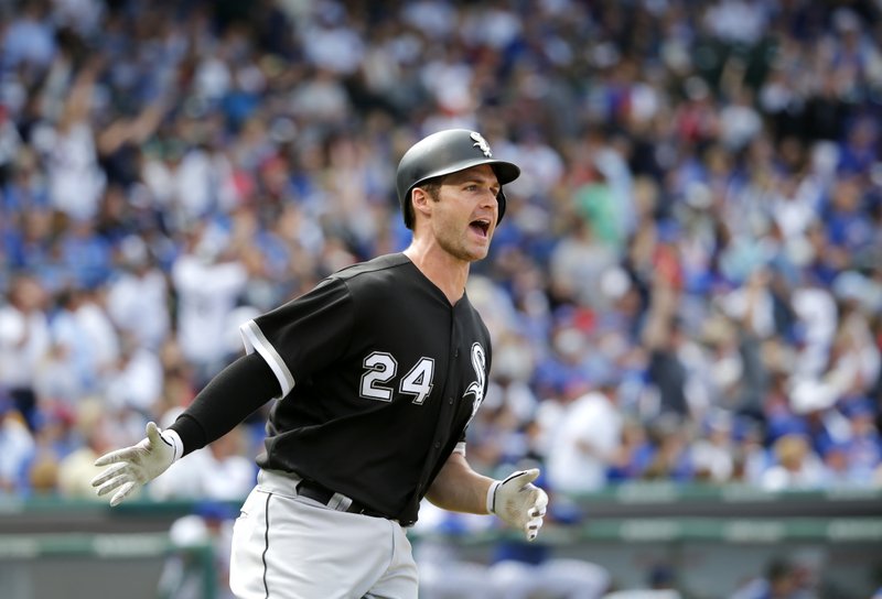 Chicago White Sox's Matt Davidson celebrates down the first base line his home run off Chicago Cubs relief pitcher Koji Uehara during the eighth inning of a baseball game Monday, July 24, 2017, in Chicago. (AP Photo/Charles Rex Arbogast)