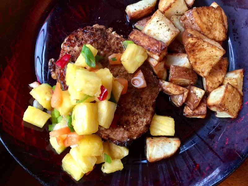Pork chops with pineapple salsa and roasted potatoes 
