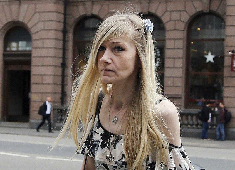 Connie Yates, the mother of critically ill baby Charlie Gard, arrives Tuesday at the Royal Courts of Justice in London. 