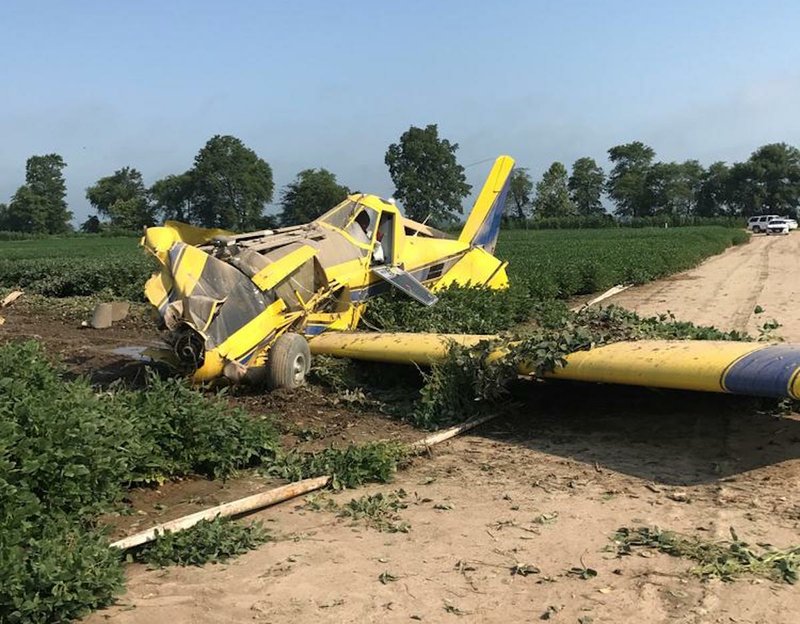 The Poinsett County sheriff's office responds to a crop duster crash south of Trumann on Tuesday, July 25, 2017.