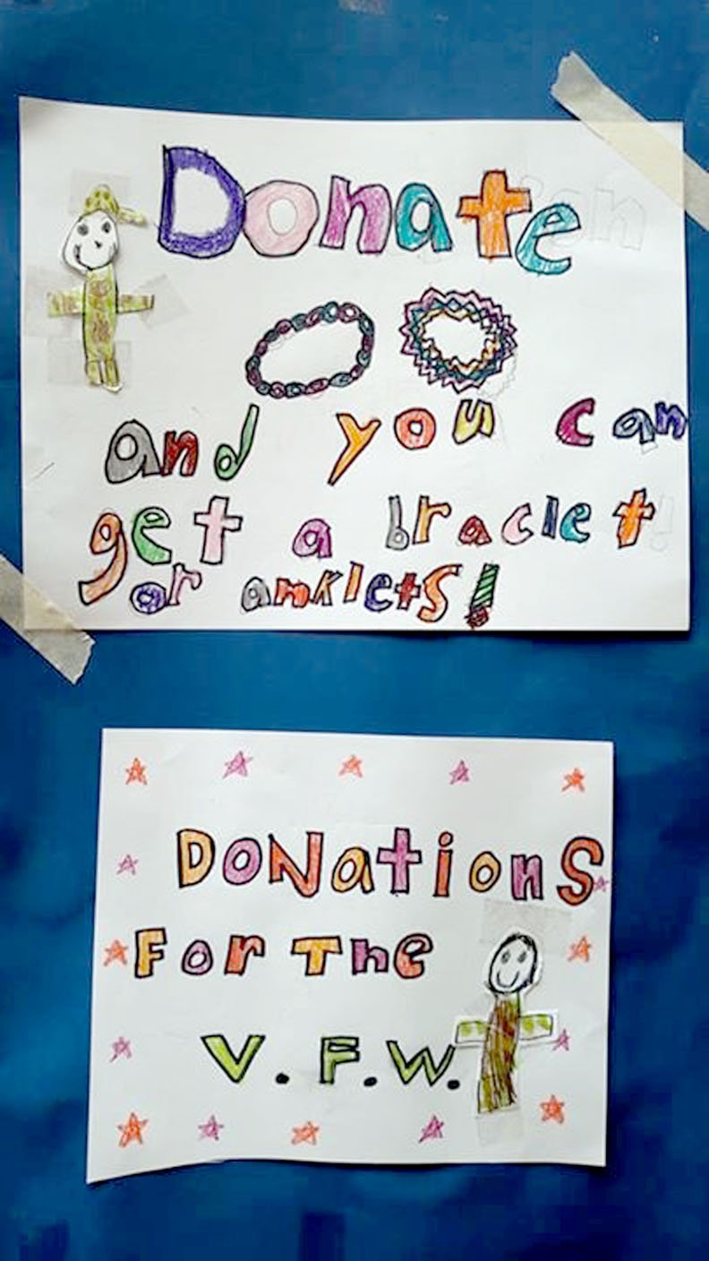 Photo Submitted These signs were used by the Moore children to raise money for the local VFW post.