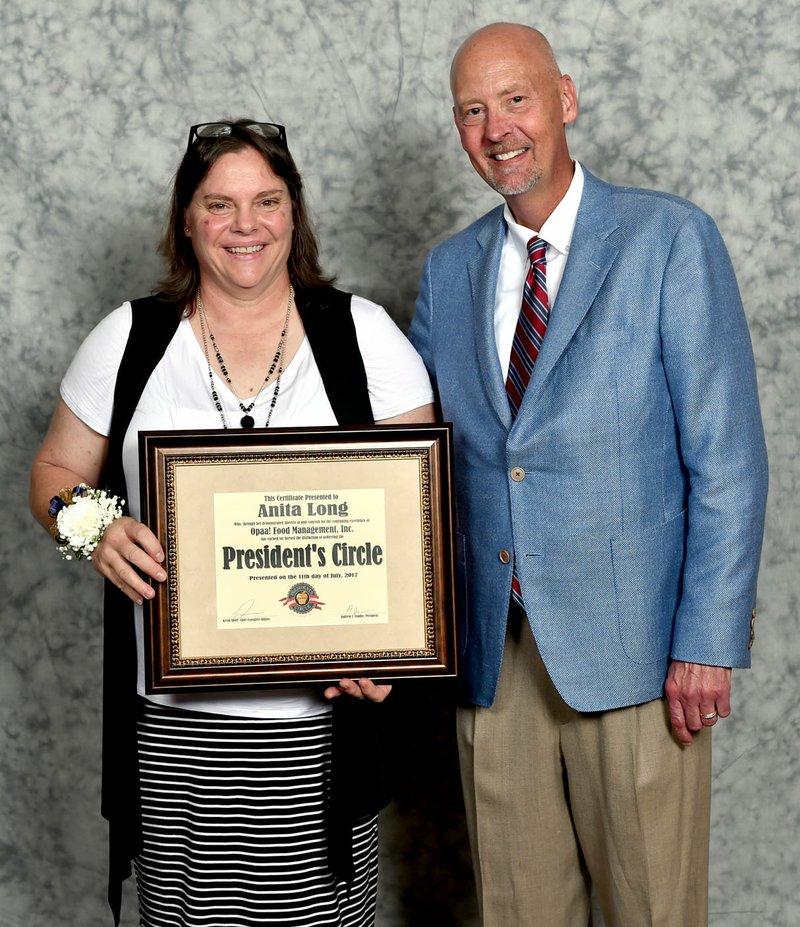 Photo submitted Anita Long, of Colcord Public Schools, was inducted into the Opaa! Food Management President&#8217;s Circle on July 11 during a ceremony in St. Louis, Mo. Long earned the recognition by being in the top 10 percent of Opaa! Food Management directors of nutrition services. The award was presented by Andy Condie, president of Opaa! Food Management.