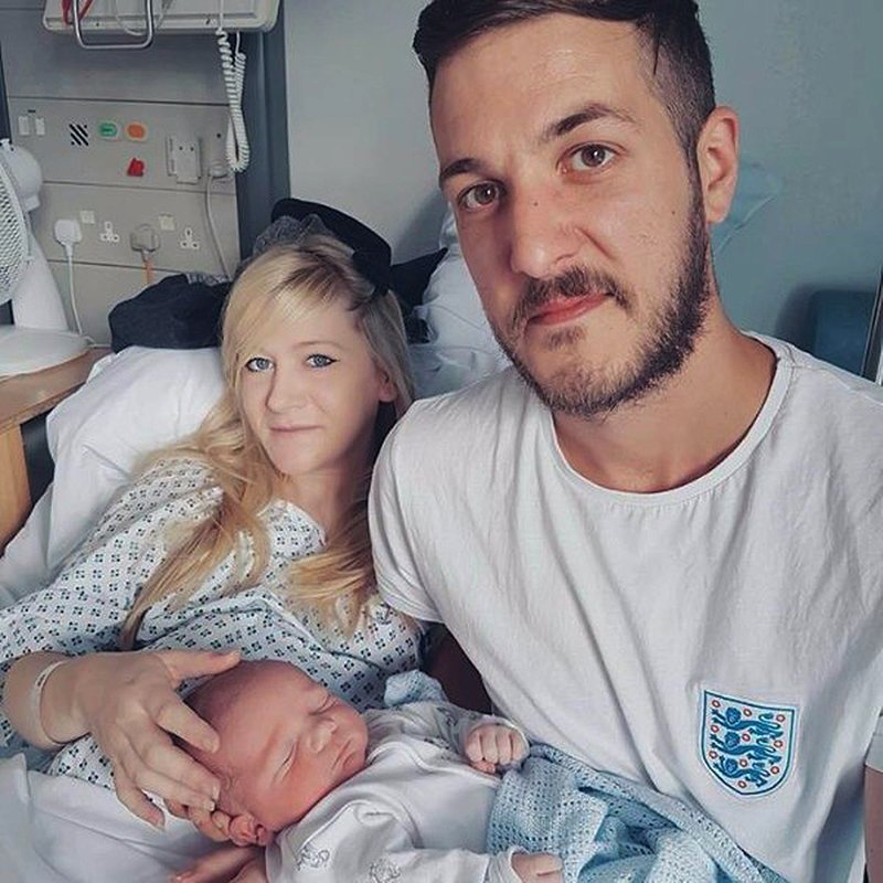 This is an undated hand out photo of Chris Gard and Connie Yates with their son Charlie Gard provided by the family, at Great Ormond Street Hospital, in London. The parents of critically ill infant Charlie Gard, Monday July 24, 2017 withdrew their court fight seeking permission to take the child to the United States for medical treatment. Chris Gard and Connie Yates wept as their attorney revealed the results of brain scans. The 11-month-old has a rare genetic condition, and his parents fought hard to receive an experimental treatment. Doctors said it wouldn't help and contended Charlie should be allowed to die peacefully. (Family of Charlie Gard via AP)