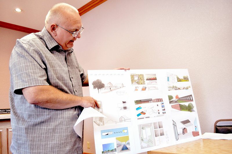 RACHEL DICKERSON/MCDONALD COUNTY PRESS Pineville Mayor Gregg Sweeten shares designs for a new recreation center during a press conference Tuesday at Pineville City Hall.