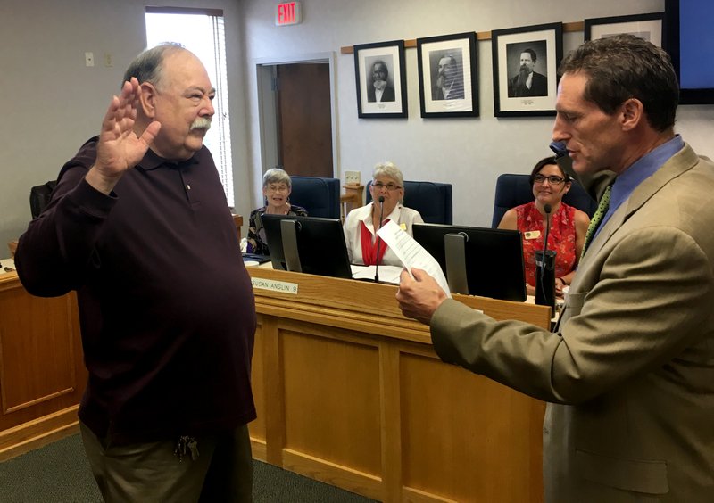 NWA Democrat-Gazette/TOM SISSOM Mike Jeffcoat is sworn in Thursday July 27, 2017 as Benton County justice of the peace by Circuit Judge Brad Karren.