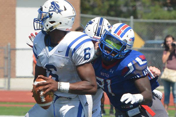 Richardson linebacker Gabe Richardson (21) closes in on Iowa Western quarterback AJ Bush during a game Saturday, Sept. 3, 2016, in Hutchinson, Kan. 