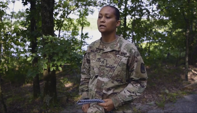 Staff Sgt. Tasheenia L. Wallace, the first woman to complete the Infantry Transition Course for the Arkansas National Guard. Still image taken from a video by Spc. Stephen Wright. 