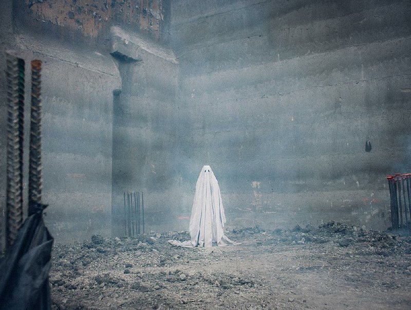 Casey Affleck is the titular apparition in David Lowery’s odd and haunting drama A Ghost Story.