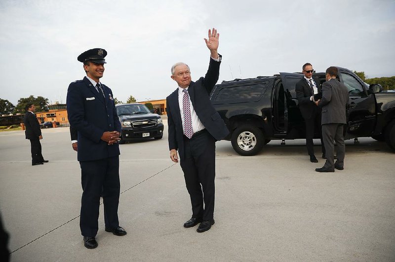 Attorney General Jeff Sessions prepares to board a plane for El Salvador on Thursday at Andrews Air Force Base, Md. 