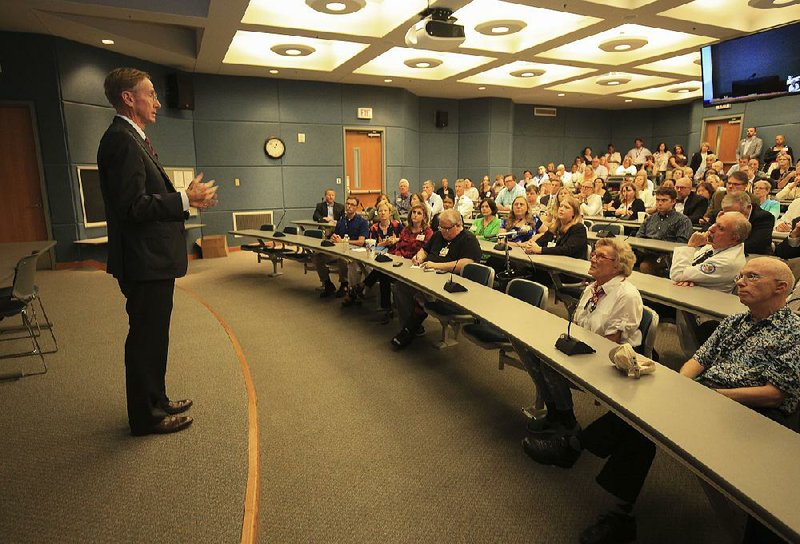 Dr. Wesley Burks answers questions from University of Arkansas for Medical Sciences staff and faculty members Wednesday as he visits the campus in Little Rock. Burks is one of two candidates for UAMS chancellor. He concluded a two-day visit to Arkansas on Thursday.