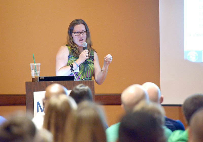 Katie Radewald, assistant dance team coach at Fayetteville High School, talks about using Google Drive for athletics programs Thursday during the Mercy Coaching Summit at the John. Q. Hammons Center in Rogers.