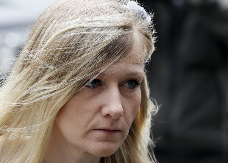 Connie Yates, mother of critically ill baby Charlie Gard arrives at the Royal Courts of Justice in London, Wednesday, July 26, 2017. A British judge is set to rule on where Charlie Gard, a baby with a rare genetic disease, will spend the last days of his life. (AP Photo/Kirsty Wigglesworth)
