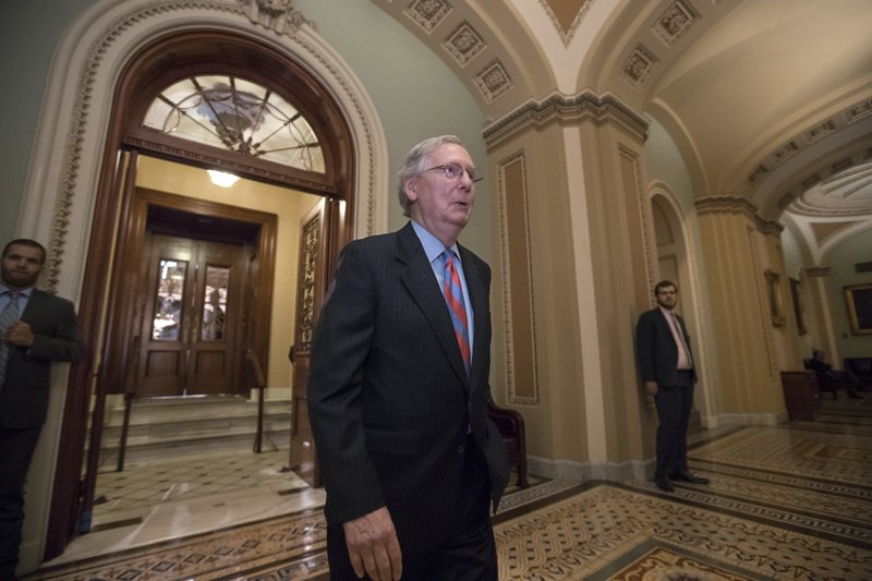 Senate Majority Leader Mitch McConnell of Ky. leaves the Senate chamber on Capitol Hill in Washington, Thursday, July 27, 2017, after a vote as the Republican majority in Congress remains stymied by their inability to fulfill their political promise to repeal and replace "Obamacare" because of opposition and wavering within the GOP ranks. (AP Photo/J. Scott Applewhite)
