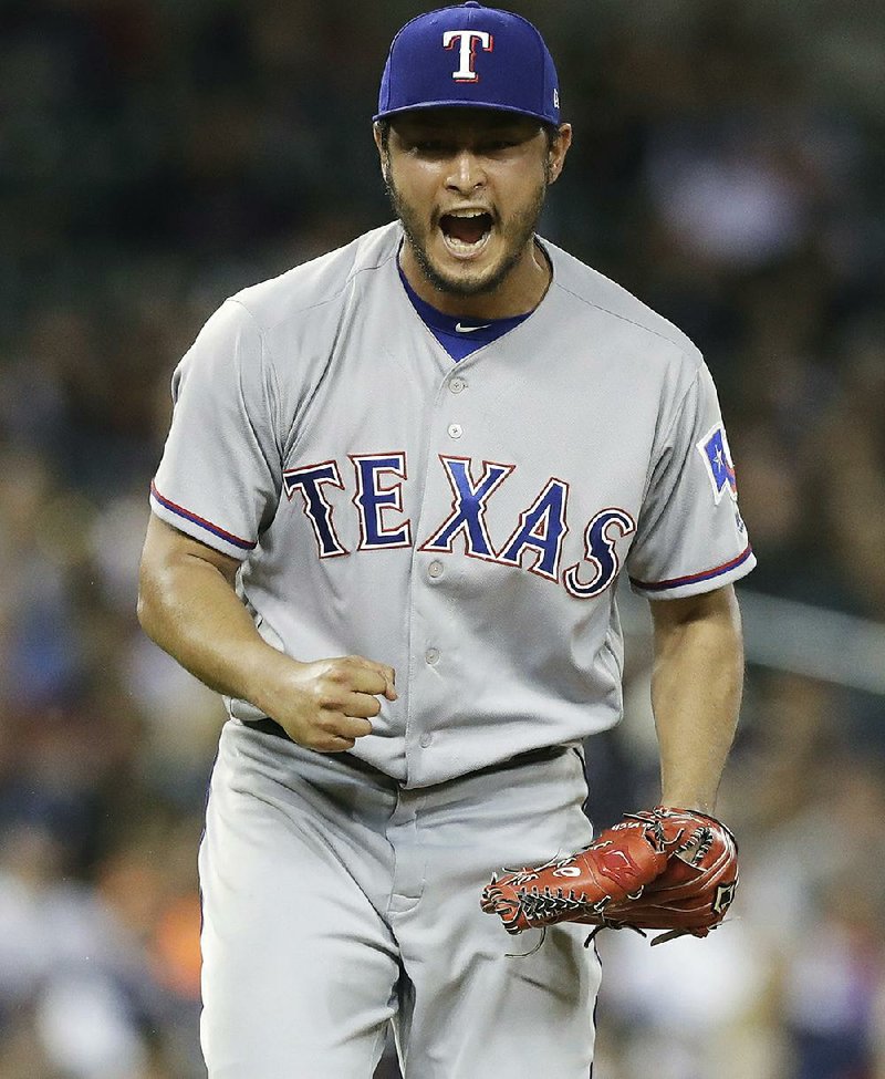 The Texas Rangers traded pitcher Yu Darvish (above) to the Los Angeles Dodgers on Monday for three minor league players. Darvish, 30, is 6-9 with a 4.01 ERA in 22 starts this season. The Dodgers (74-31) entered Monday leading the National League West by 14 games over the Arizona Diamondbacks and are attemping to win their first World Series title since 1988.