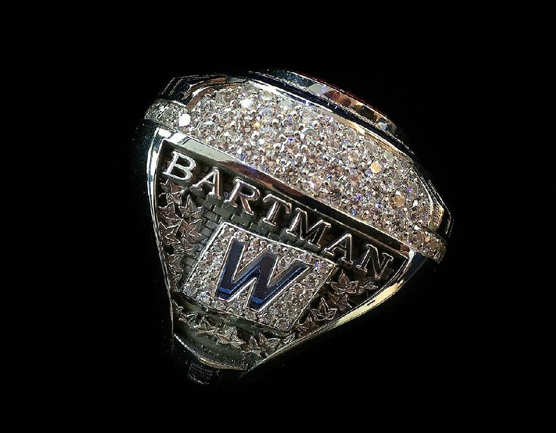 Fourteen years after being cast as a scapegoat for his role in the Chicago Cubs’ 8-3 loss to the Florida Marlins in Game 6 of the 2003 National League Championship Series, Steve Bartman was given a World Series ring by Cubs ownership Monday at Wrigley Field.